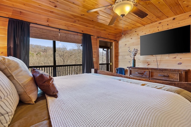 bedroom with wooden walls, ceiling fan, and wooden ceiling