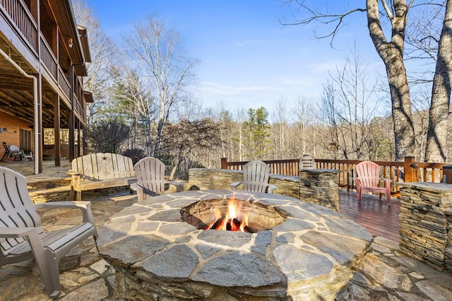 view of patio / terrace with a fire pit