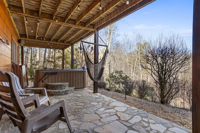 view of patio / terrace featuring a hot tub