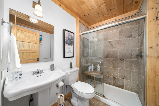 bathroom with wood ceiling, toilet, and an enclosed shower