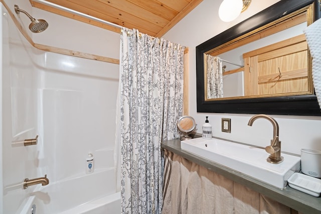 bathroom with sink, wood ceiling, and shower / tub combo with curtain