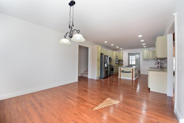 dining area with a notable chandelier and dark wood-type flooring