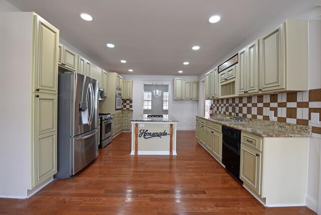 dining room featuring a notable chandelier and hardwood / wood-style flooring