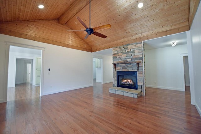 living room featuring high vaulted ceiling, ceiling fan, hardwood / wood-style flooring, and wood ceiling