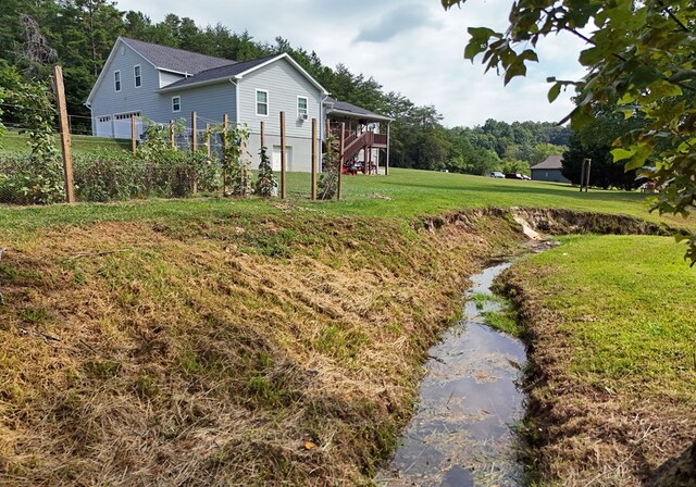 view of yard with a garage