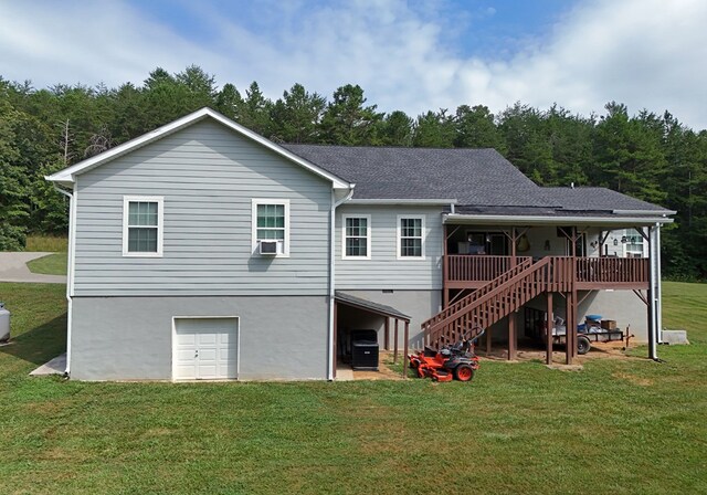 view of home's exterior featuring a lawn and a garage