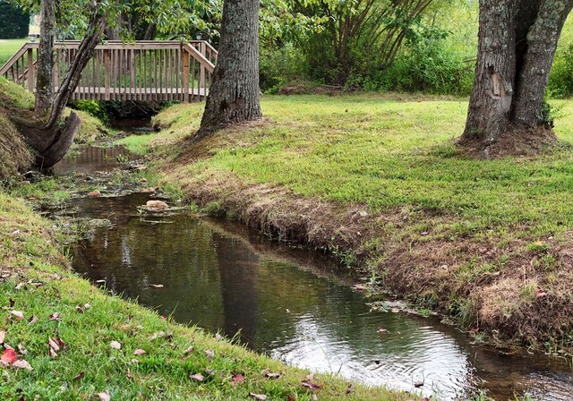 surrounding community with a yard