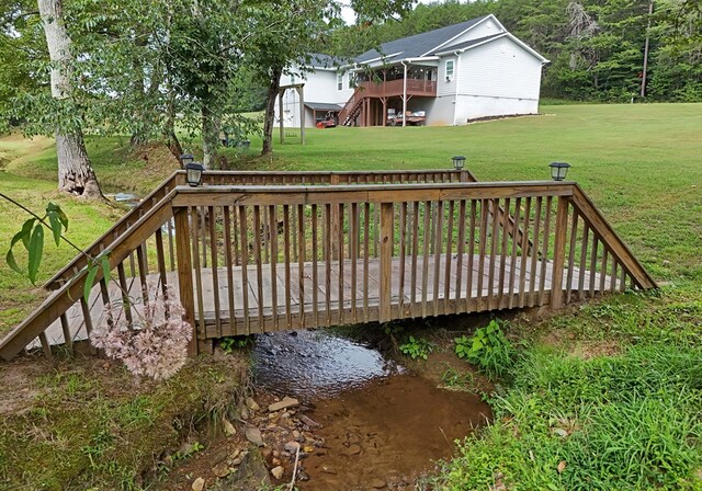 view of yard with a wooden deck