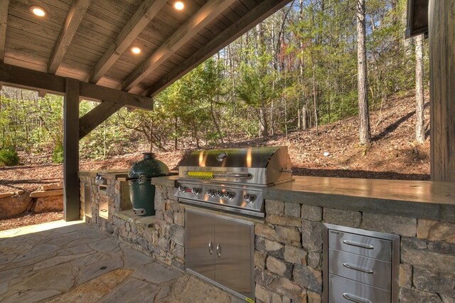 view of patio / terrace with area for grilling and exterior kitchen