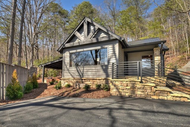 view of front of house with fence