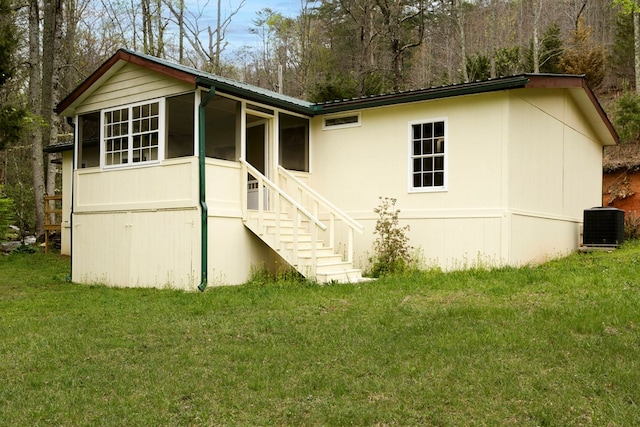 349 Kirby Ln, Murphy, NC 28906 - back of house with central air condition unit, a sunroom, a lawn, metal roof, and stairs