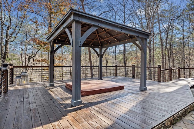 wooden terrace with a gazebo