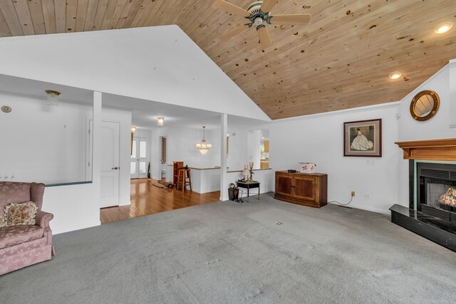 498 Old Dyer Rd, Hayesville, NC 28904 - carpeted living room with wooden ceiling, a glass covered fireplace, a ceiling fan, and high vaulted ceiling