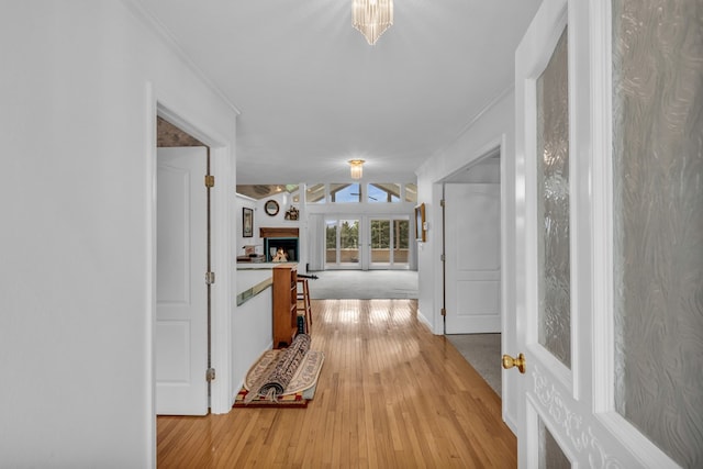 498 Old Dyer Rd, Hayesville, NC 28904 - hallway featuring light wood-type flooring and ornamental molding