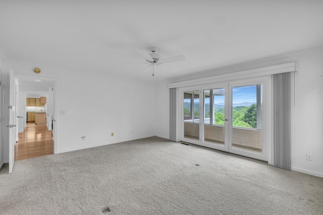 498 Old Dyer Rd, Hayesville, NC 28904 - carpeted spare room with ceiling fan and baseboards