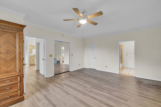 498 Old Dyer Rd, Hayesville, NC 28904 - spare room featuring light wood-type flooring, ceiling fan, ornamental molding, and baseboards