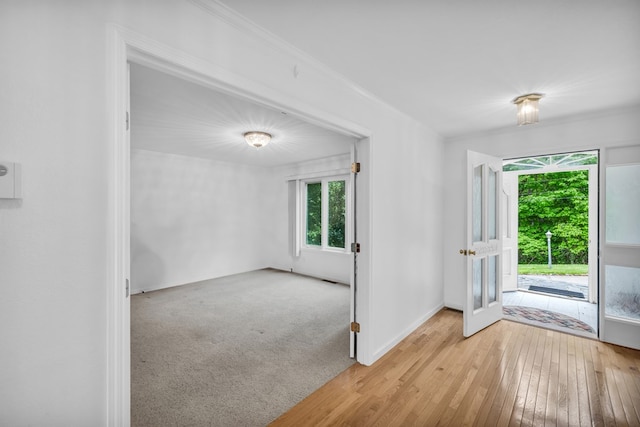 498 Old Dyer Rd, Hayesville, NC 28904 - entryway featuring wood-type flooring, baseboards, crown molding, and french doors