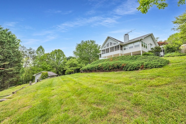 498 Old Dyer Rd, Hayesville, NC 28904 - view of grassy yard featuring a sunroom and a garage
