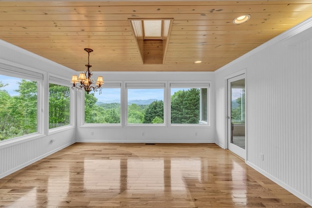 498 Old Dyer Rd, Hayesville, NC 28904 - unfurnished sunroom featuring hardwood / wood-style floors, crown molding, wooden ceiling, a chandelier, and baseboards