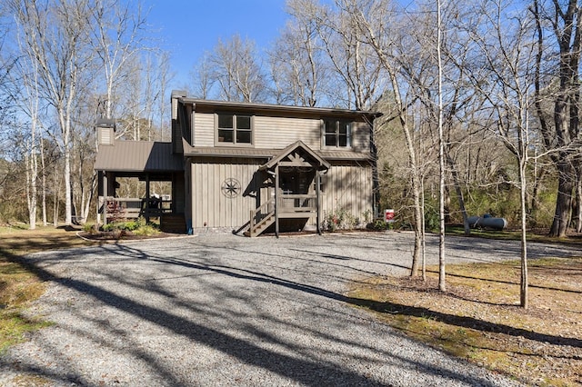 view of front of house with a chimney