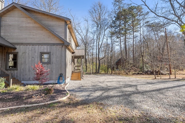 view of home's exterior featuring driveway