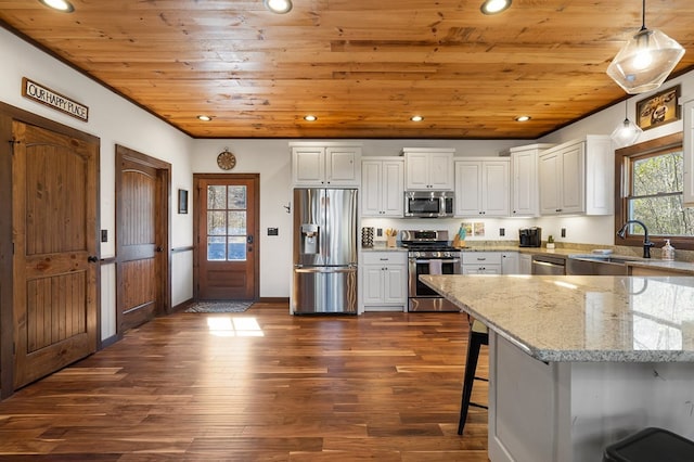 kitchen featuring appliances with stainless steel finishes, wood ceiling, dark wood-style flooring, recessed lighting, and light stone counters