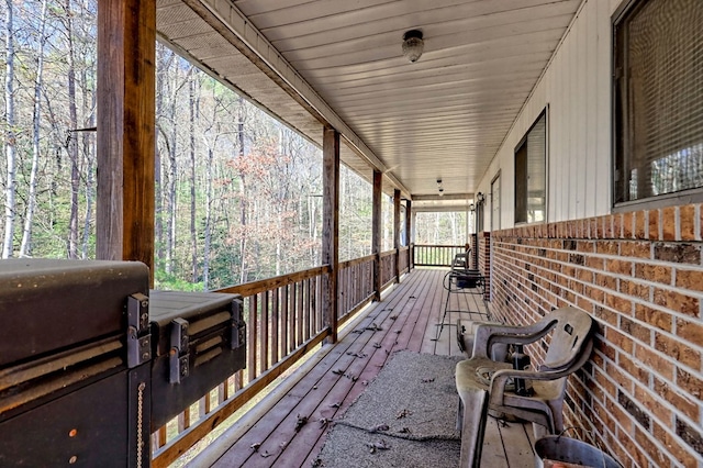 wooden terrace with covered porch