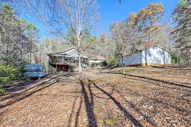 view of yard with a deck