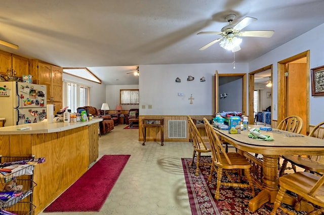 dining space featuring ceiling fan