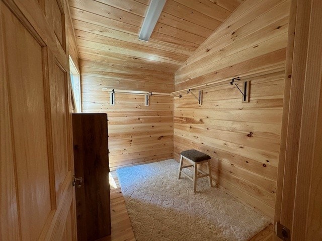 mudroom with wood walls, light wood-type flooring, vaulted ceiling, and wooden ceiling