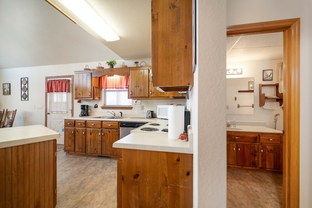 1544 Country Walk, Murphy, NC 28906 - kitchen featuring light countertops, a sink, light floors, brown cabinetry, and white microwave