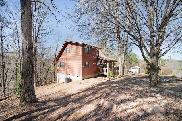 1544 Country Walk, Murphy, NC 28906 - view of home's exterior featuring central AC unit, a shed, a deck, and an outdoor structure