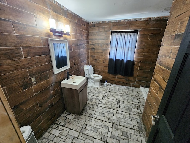27 Russell Farm Rd, Andrews, NC 28901 - bathroom featuring toilet, vanity, and brick patterned flooring