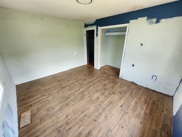 27 Russell Farm Rd, Andrews, NC 28901 - unfurnished bedroom featuring hardwood / wood-style floors and a closet