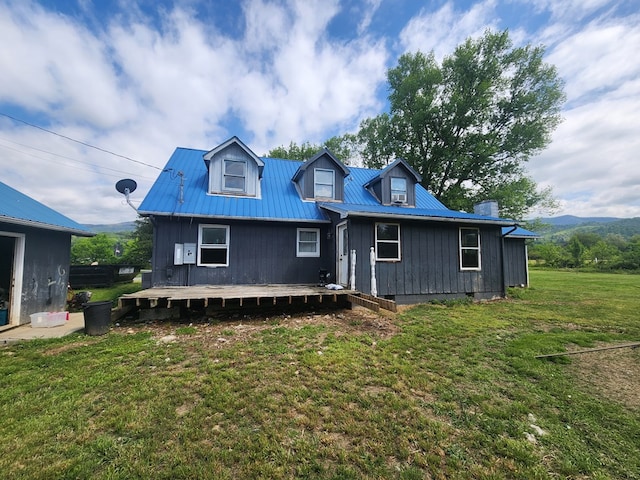 27 Russell Farm Rd, Andrews, NC 28901 - rear view of property with metal roof, a lawn, and a wooden deck
