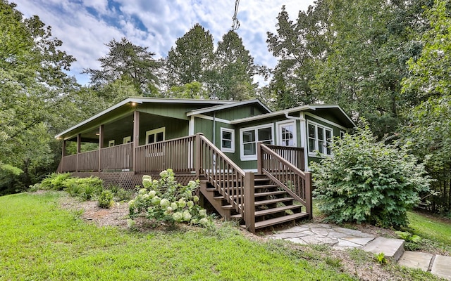 exterior space with a front lawn