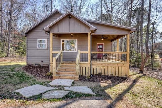 bungalow-style home featuring ceiling fan and a porch