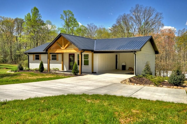975 Goss Rd, Epworth, GA 30541 - view of front of home featuring driveway, a carport, a front yard, and brick siding