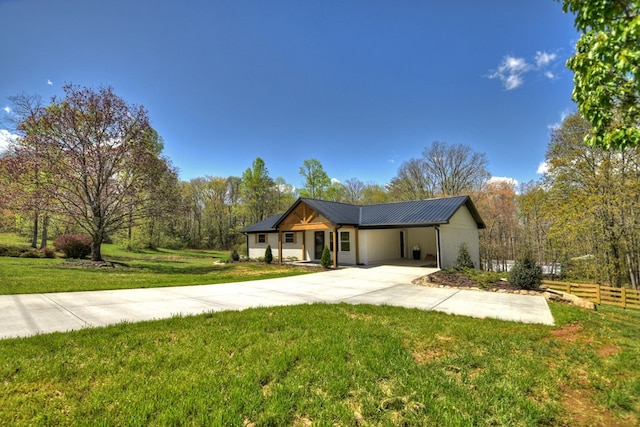 975 Goss Rd, Epworth, GA 30541 - view of front of house with driveway, metal roof, and an attached carport