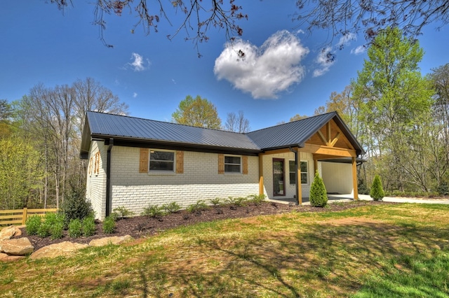 975 Goss Rd, Epworth, GA 30541 - view of front facade featuring metal roof and brick siding