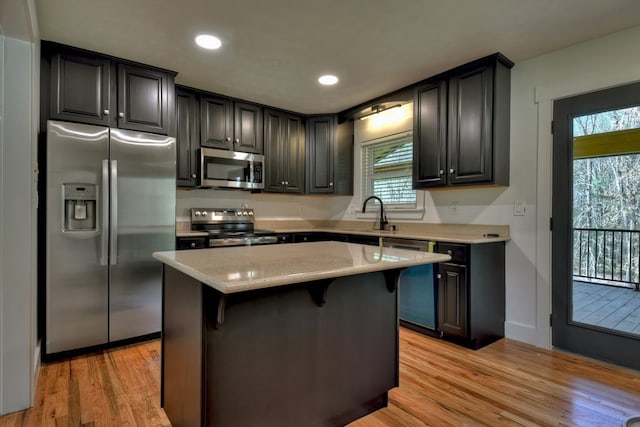975 Goss Rd, Epworth, GA 30541 - kitchen featuring stainless steel appliances, plenty of natural light, light wood finished floors, light countertops, and recessed lighting