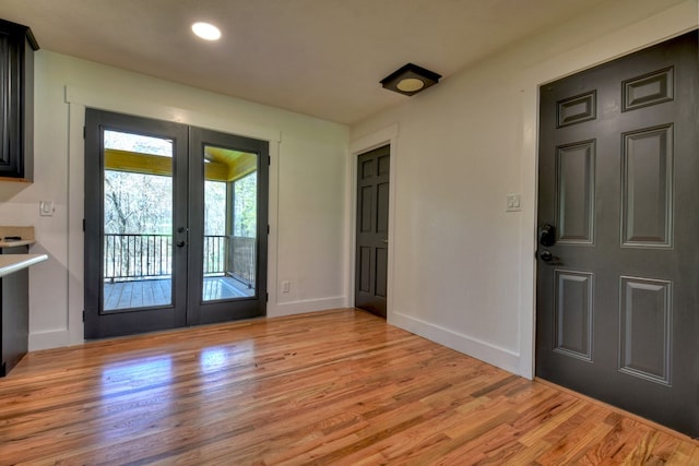 975 Goss Rd, Epworth, GA 30541 - entryway with french doors, light wood finished floors, baseboards, and recessed lighting