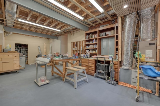 basement with a workshop area