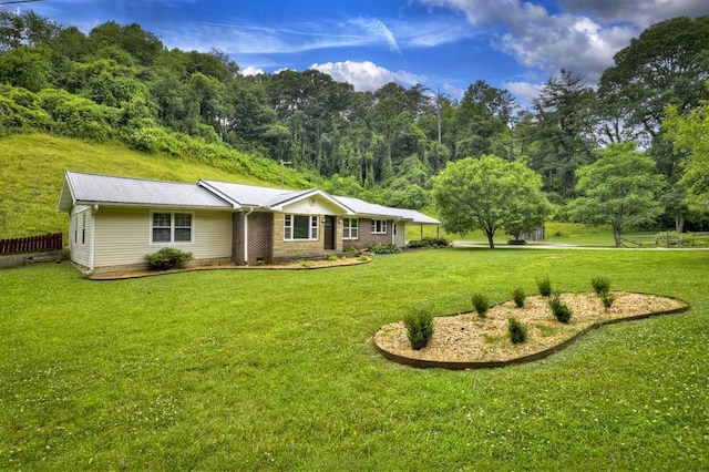 view of front facade with a front yard