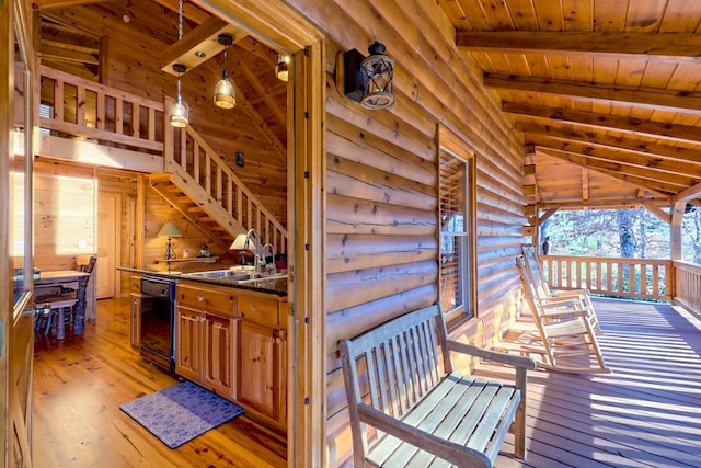 wooden terrace featuring a sink