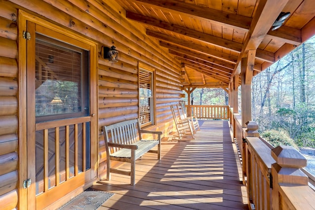 wooden terrace featuring a porch