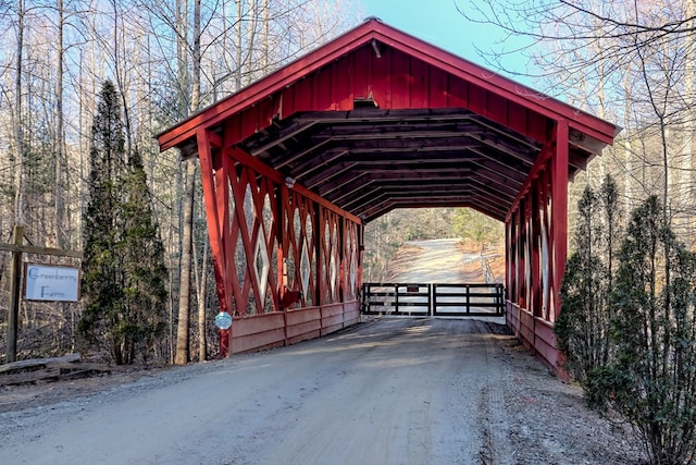 view of outbuilding with a carport