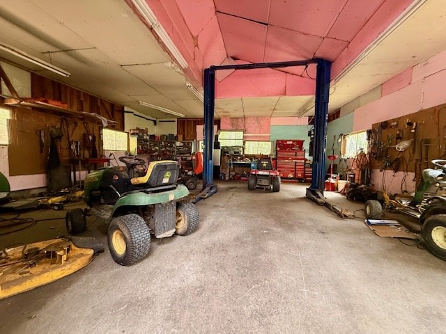 garage featuring a workshop area