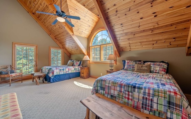 carpeted bedroom featuring multiple windows, high vaulted ceiling, wood ceiling, and ceiling fan