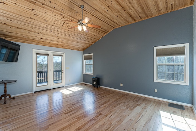 unfurnished living room with ceiling fan, lofted ceiling, light hardwood / wood-style flooring, and wooden ceiling